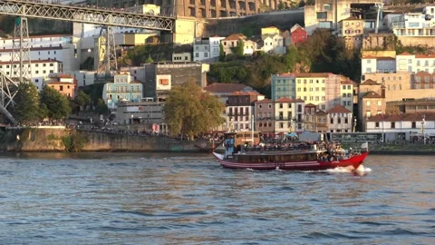 Zoom out of Douro river and Ribeira at sunset Stock Footage 307210048