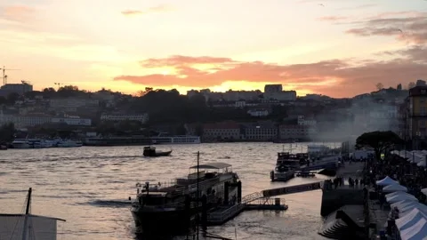 Zoom out of Douro river and Ribeira at sunset, Porto, Portugal. Stock Footage 307210057