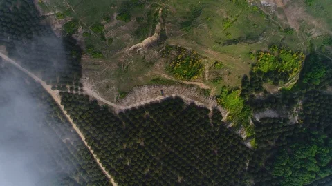 Zoom out with drone as clouds pass by, oe01 Stock Footage 116815104