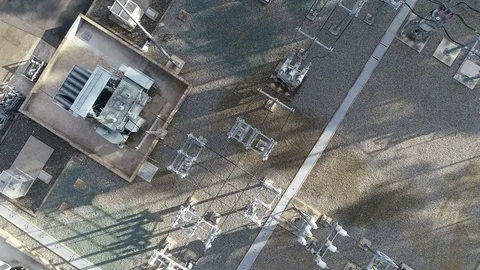 Zoom out drone view of electricity transformer power station Stock Footage 93623400
