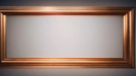 Zoom out effect on a golden frame hanging on a dark wall with a ray of light. Stock Footage 273954206