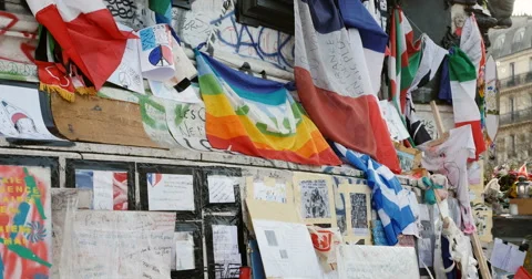 Zoom out from flags at Place de la Republique monument , Paris, France Stock Footage 60195467