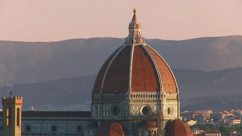 Zoom out frtom close up of dome to roof top view of the Florence Duomo, Stock Footage 74794027