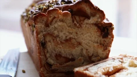 Zoom out of Homemade braid bread babka on cutting board Stock Footage 229702147