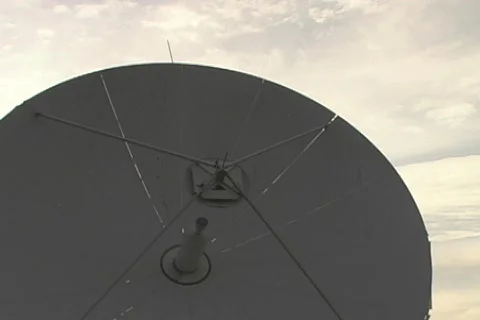 Zoom Out of Large Satellite Dish Stock Footage 144355
