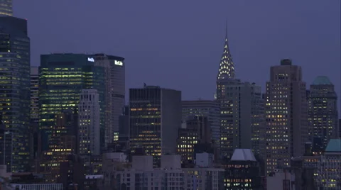 Zoom-out on Midtown Manhattan skyscrapers at dusk. Shot in November 2011. Stock Footage 59171148
