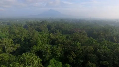 Zoom out of Mount Merapi for the distance with drone camera Stock Footage 155201403