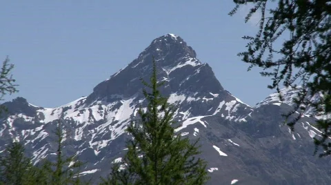 Zoom out from mountain to hikers resting Stock Footage 532653