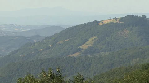 Zoom out from the mountaintop to raspberry orchard Stock Footage 35582785