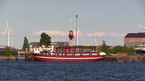 Zoom-out from old, red lightship in the port of Copenhagen Video stock 50055512