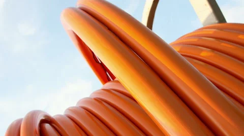 Zoom-out on orange cable on drum 스톡 동영상 51224737