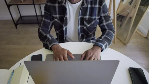 Zoom out an overhead view of a stylish African-American student with glasses Stock Footage 289019423