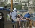 Zoom out from people on moving gulet SD Footage
