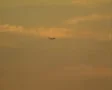 Zoom out from plane flying over city SD Footage