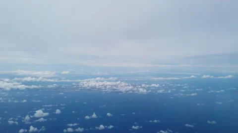 Zoom Out of Plane Window to Blue Skies 2 Stock Footage