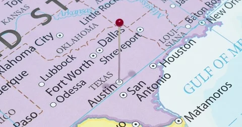 A zoom out of a red pin into a Austin city of The United States of America Video stock 323772821