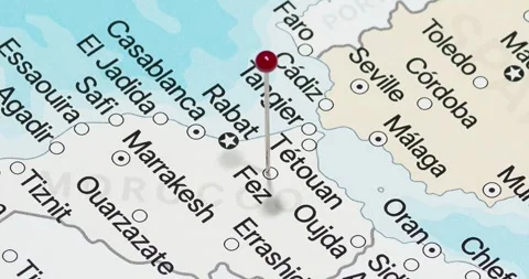 A zoom out of a red pin into fez city of morocco political map Video stock 324821582