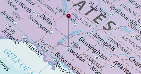 A zoom out of a red pin into a Jackson city of The United States of America Video stock 323773460
