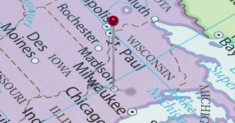A zoom out of a red pin into a madison city of The United States of America Stock Footage 323773802