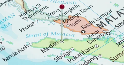 A zoom out of a red pin into medan city of indonesia political map Video stock 325254875