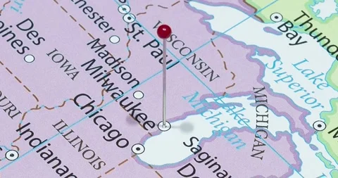 A zoom out of a red pin into a milwaukee city of The United States of America Video stock 323773953