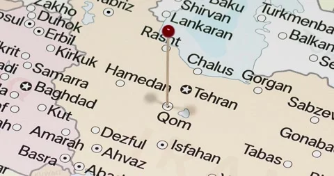 A zoom out of a red pin into Qom city of Iran political map 스톡 동영상 324822181