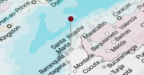 A zoom out of a red pin into Santa Marta city of Colombia political map Video stock 323774789