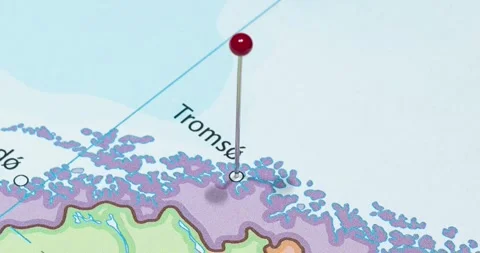 A zoom out of a red pin into a tromso city of norway political map Stockbeeldmateriaal 323774944
