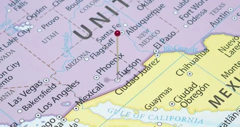 A zoom out of a red pin into a Tucson city of The United States of America Video stock 323774994