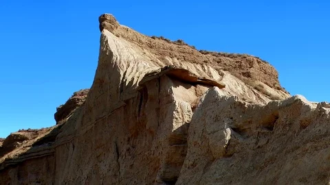 Zoom out of rock formations - Bardenas Riales Natural Park, Navarre, Spain Stock Footage 74601229