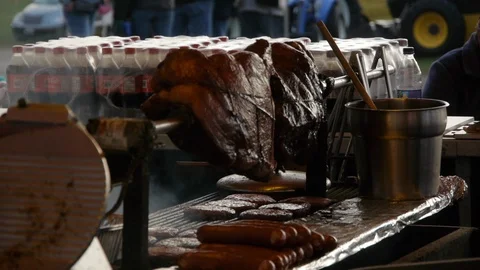 Zoom Out on Rotating Meat on Grill Stock Footage 92758091