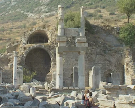 Zoom out from ruins and tour group Stock Footage