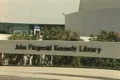Zoom out from sign of John Fitzgerald Kennedy Library to full building Footage