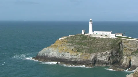 Zoom out from South Stack Lighthouse on Holy Island, Anglesey Stock Footage 33846051