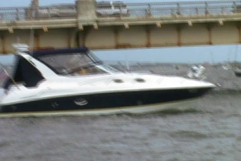 Zoom Out of St. Augustine Boat and Bridge Stock Footage 147313