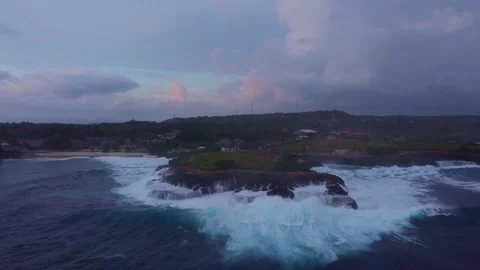 Zoom Out: Storm at Cliffs of Devils Tear (Bali) Stock Footage 200460739