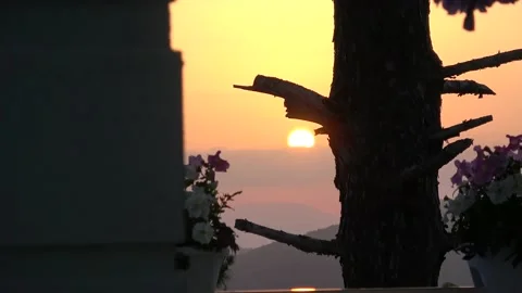 Zoom out sun set and infinity swimming pool area Stock Footage 133159742