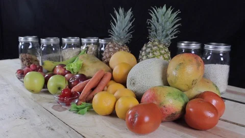 Zoom out from table with fruits, vegetables and grains - 02 스톡 동영상 130082017