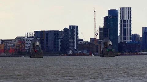 Zoom out from Thames river barrier in London Видео 83765260