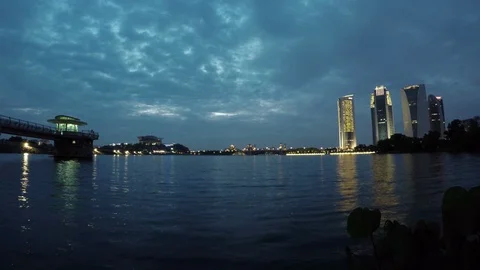 Zoom out time lapse during dramatic cloudy sky at lake near Putrajaya city. Stock Footage 85639315