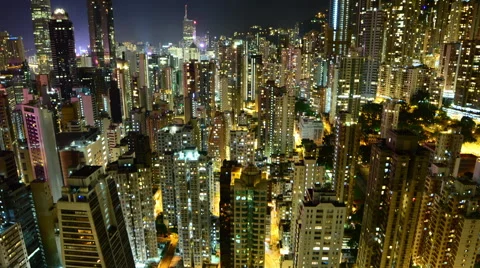 Zoom Out / Time Lapse of Hong Kong Skyline and Victoria Harbour at Night Stock Footage 45852358