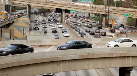Zoom Out /Time Lapse of Traffic on Busy Freeway in Downtown Los Angeles Stock Footage 45954363