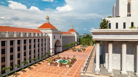 Zoom out Timelapse of SG, CL building at Assumption University against cloud sky Video stock 111159005