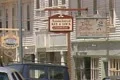 Zoom out from traditional looking shops Footage