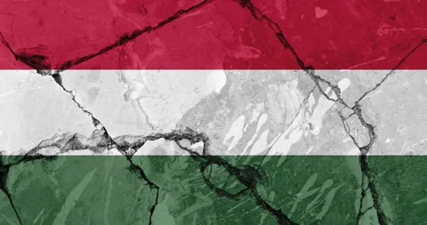 A zoom out video of an old grunge cracked wall with the hungary flag Video stock 337428997