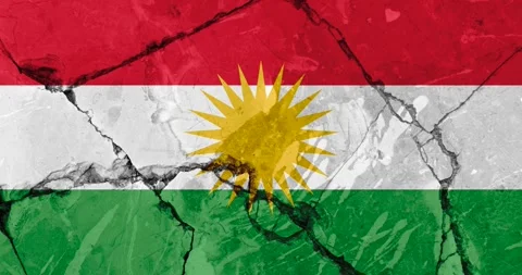A zoom out video of an old grunge cracked wall with the kurdistan flag Video stock 337429359