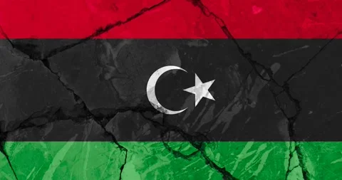 A zoom out video of an old grunge cracked wall with the libya flag Video stock 337429659