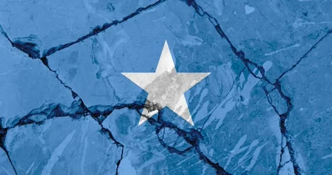 A zoom out video of an old grunge cracked wall with the somalia flag Video stock 337431376