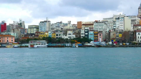 Zoom out view of the busy riverside of Istanbul Stock Footage 61870568