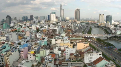 Zoom out view of the river and the skyline of the Ho Chi Minh City Stock Footage 61871127